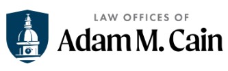 Adam M. Cain logo